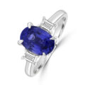 Platinum Three-stone Oval Sapphire and Baguette Diamond ring